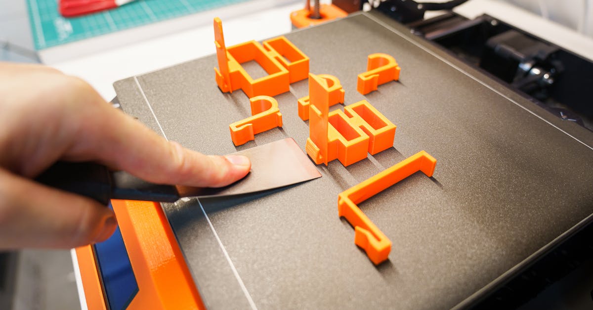 Various 3D printed parts showing different surface finish levels and post-processing techniques